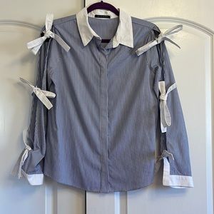 DECKER blue and white striped button down shirt with ties on the sleeve. Size S